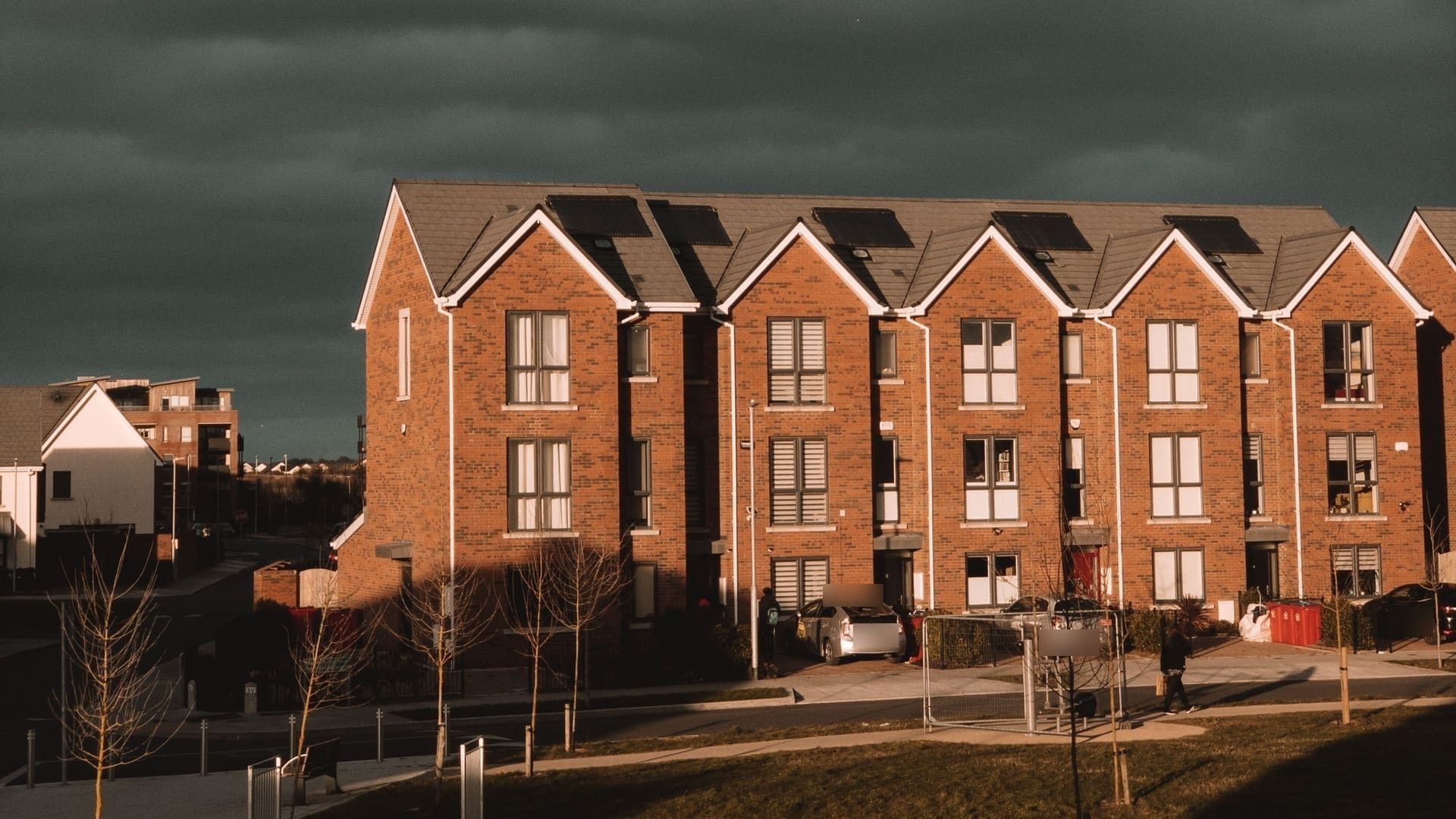 New-build brick terraced homes, illustrative