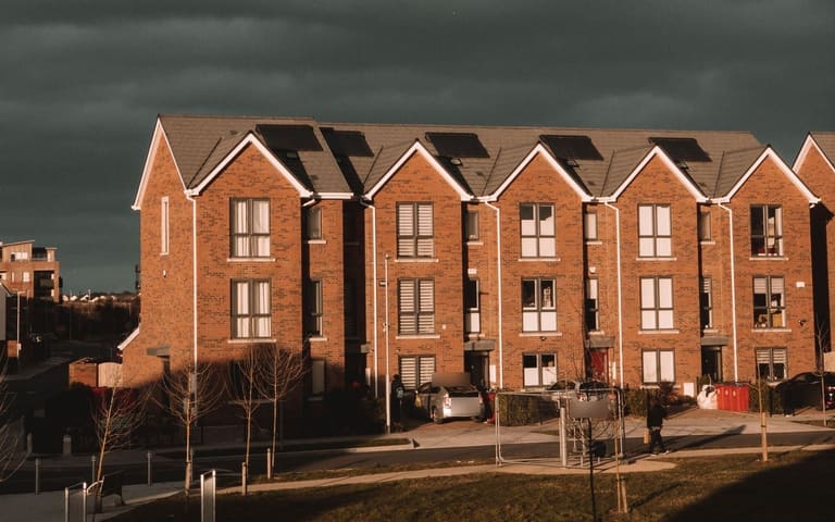 New-build brick terraced homes, illustrative