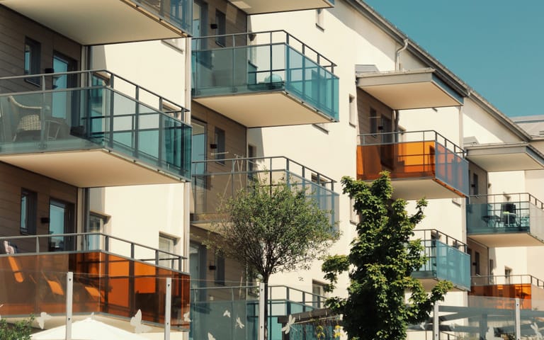 Apartment balconies on a new block, illustrative