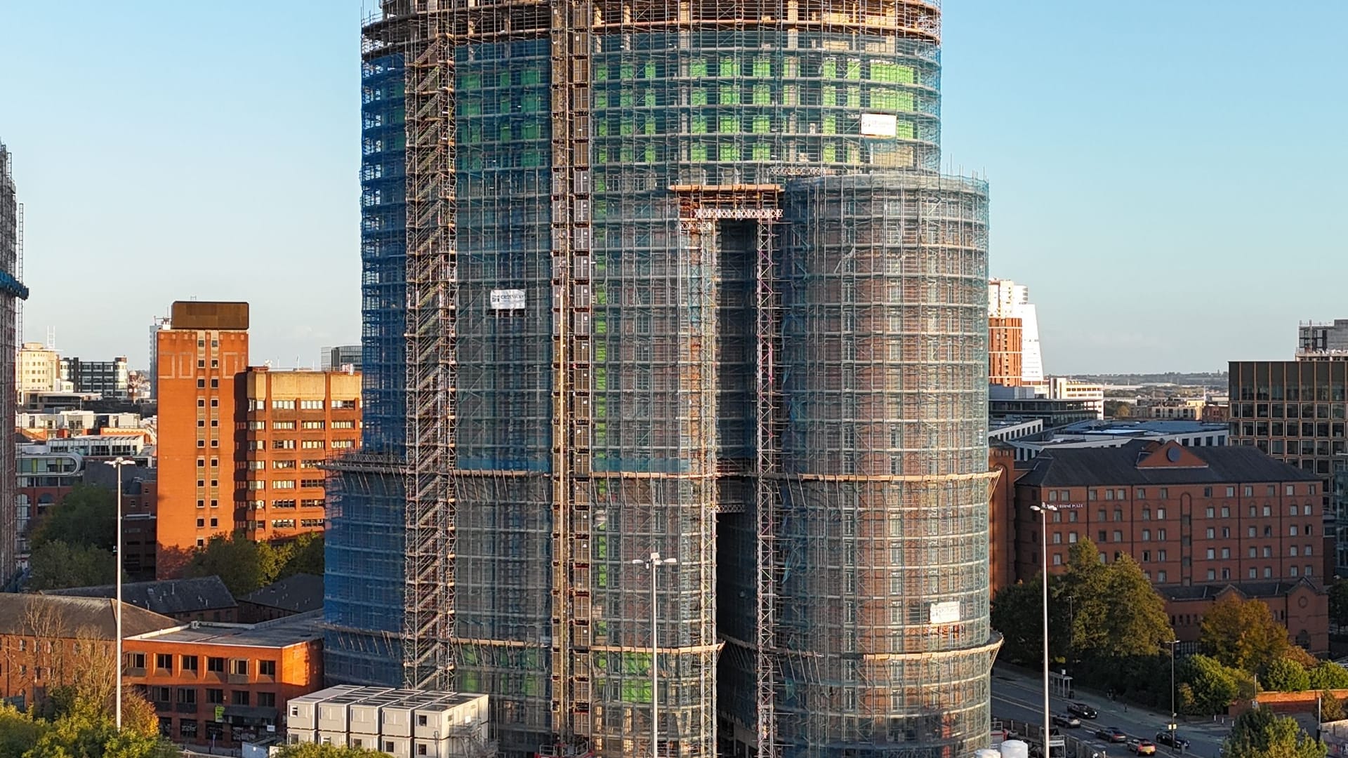 Residential tower under construction, illustrative
