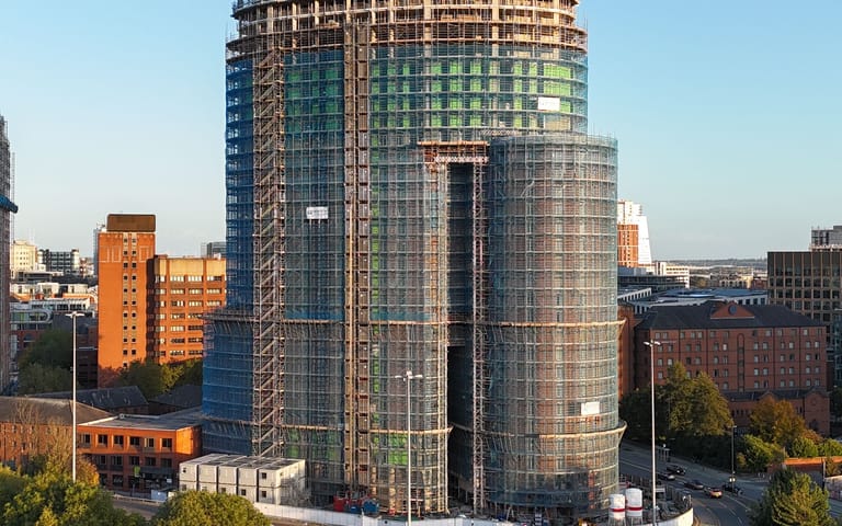 Residential tower under construction, illustrative