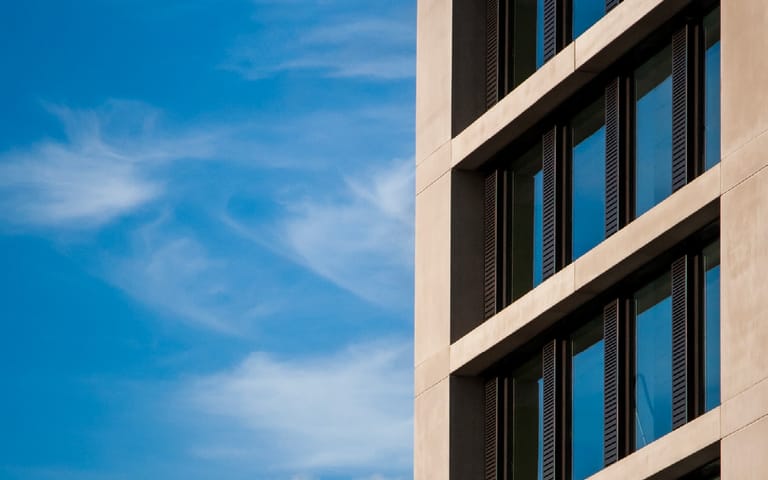 Facade of a modern residential tower, illustrative